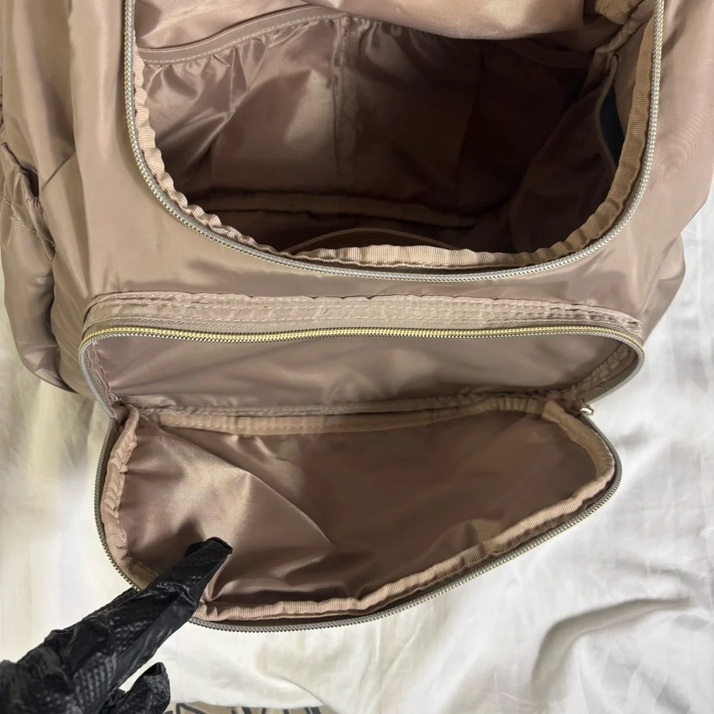 Mommore tan basket weave nylon diaper bag backpack gold hardware